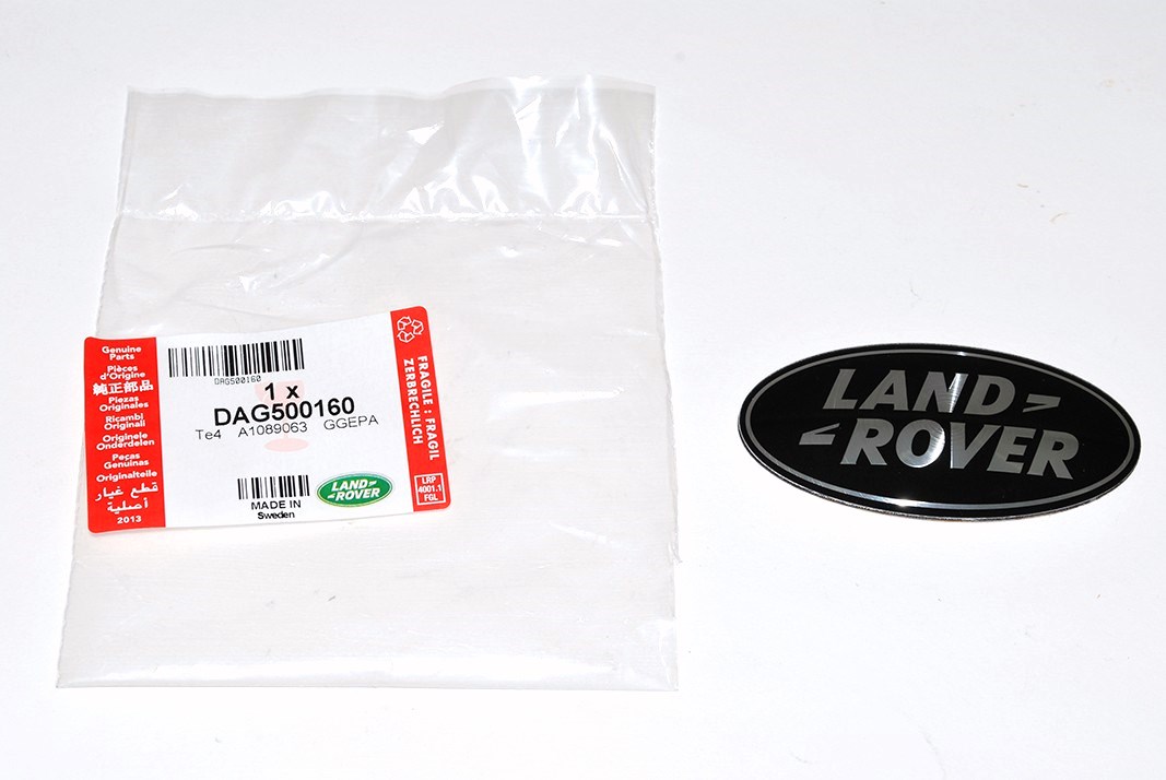 Эмблема решетки радиатора (черный/серебристый) LAND ROVER (DAG500160||LAND ROVER)